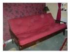 Stylish futon. Stylish double futon with red mattress....